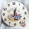 alt="Boîte cadeau luxe contenant l'horloge enfant personnalisée, prêt à offrir"